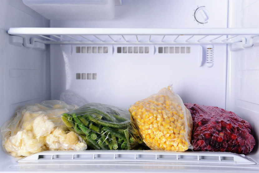 vegetables in bags in freezer