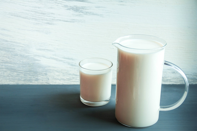 pitcher and glass of goat's milk